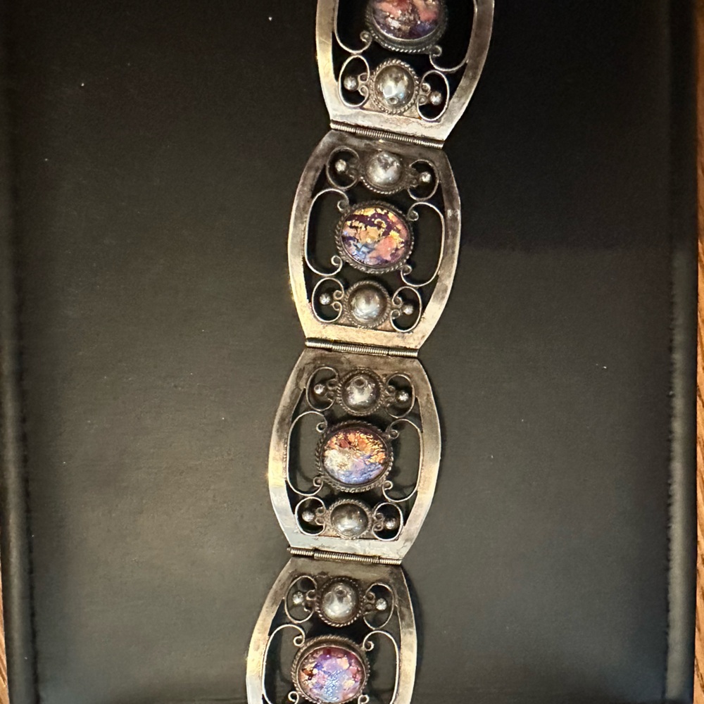 Sterling Silver bracelet with Fire Opal stones.